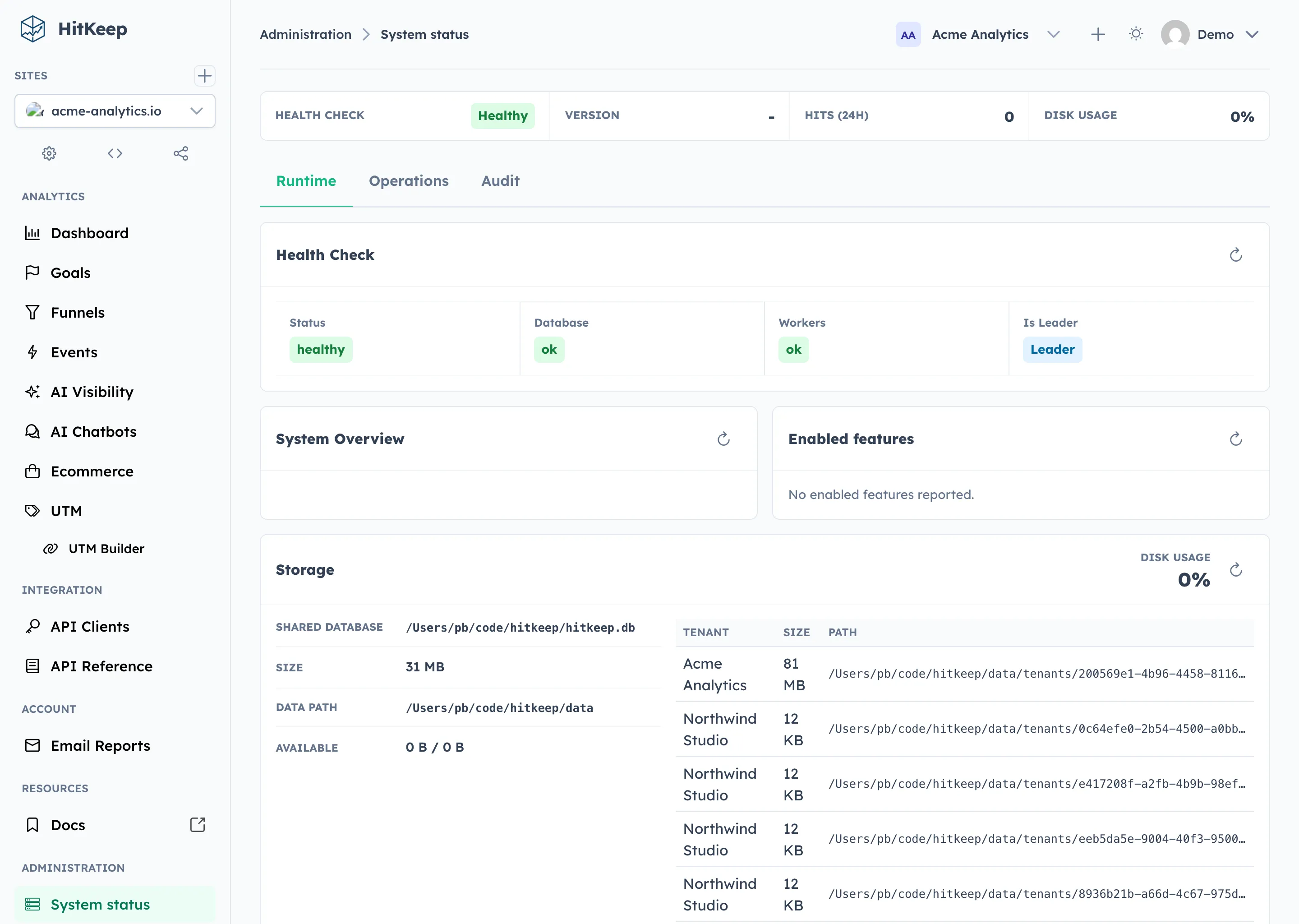 HitKeep System Status page with health, runtime, storage, tenant database sizes, and enabled features