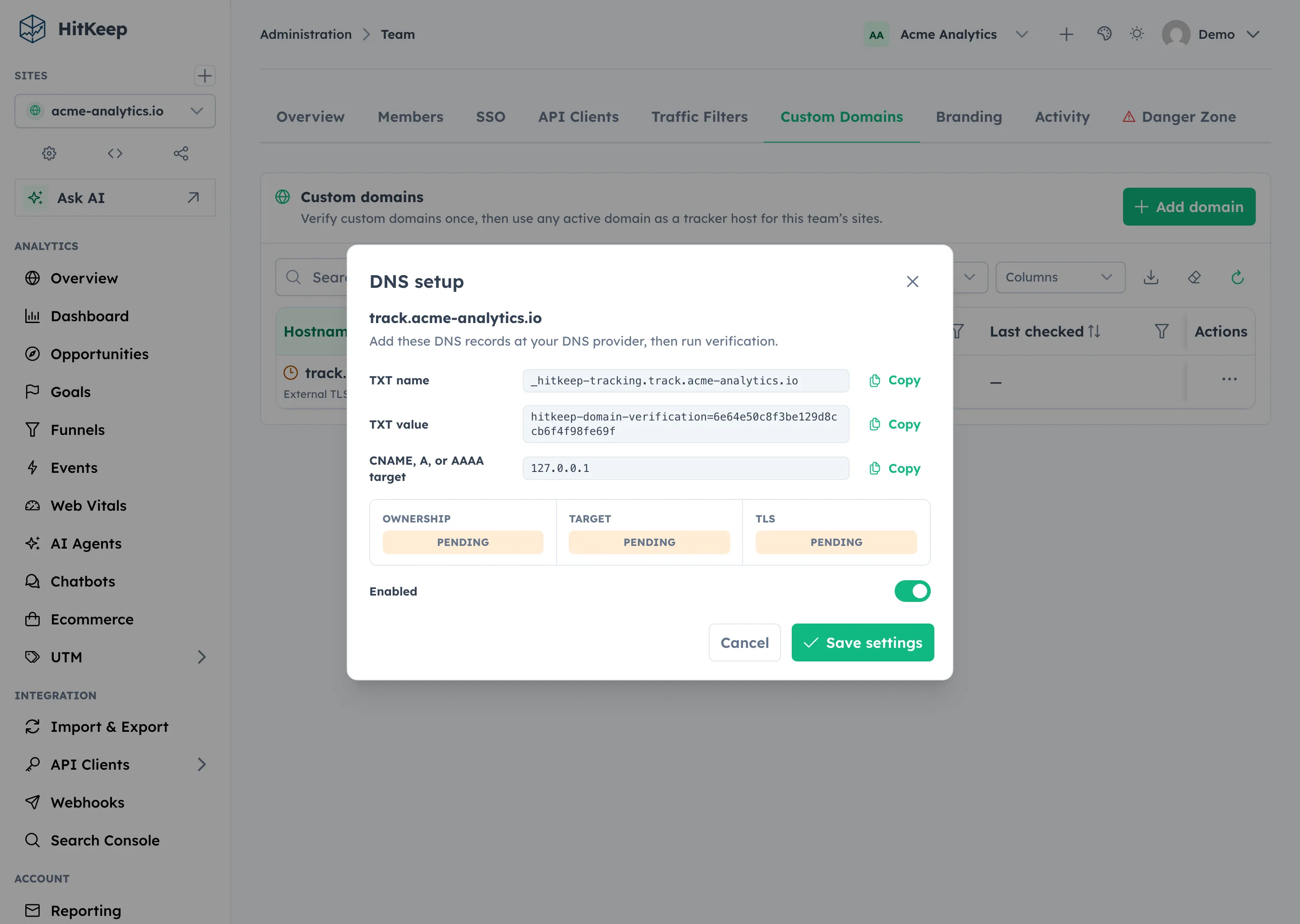HitKeep DNS setup dialog listing the TXT name, TXT value, and DNS target records with copy buttons and verification status