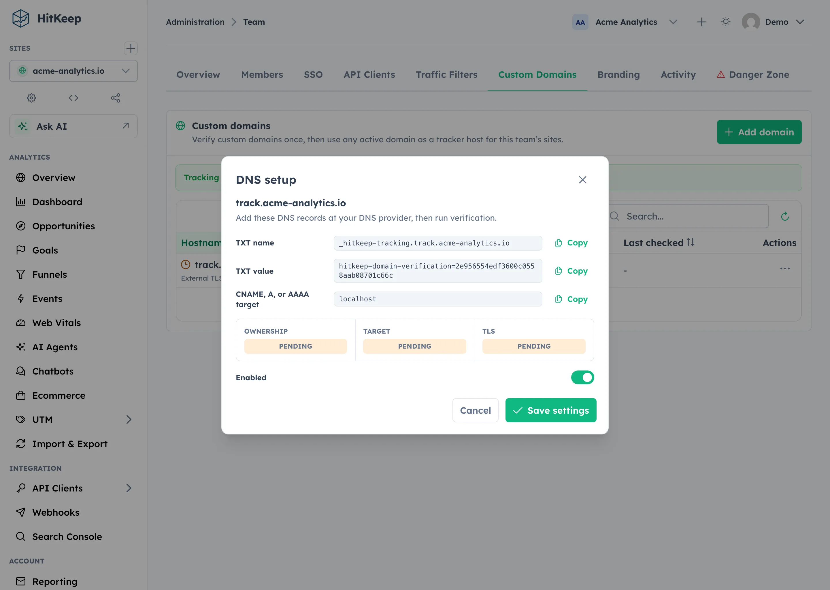 HitKeep DNS setup dialog listing the TXT name, TXT value, and DNS target records with copy buttons and verification status