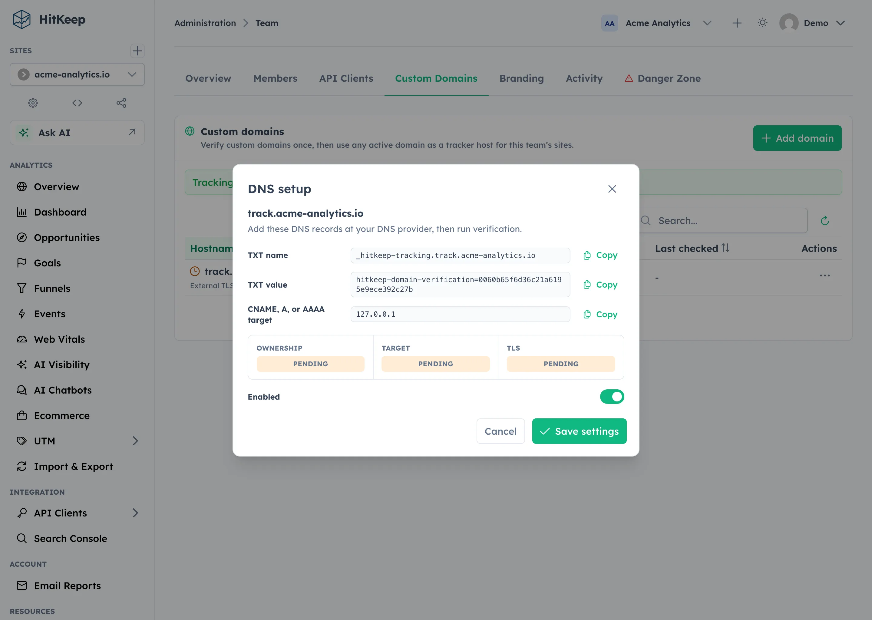 HitKeep DNS setup dialog listing the TXT name, TXT value, and DNS target records with copy buttons and verification status