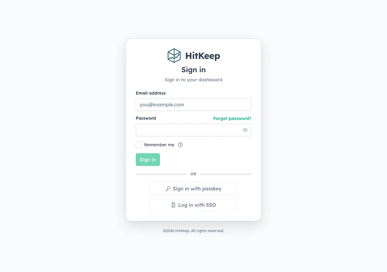 HitKeep 2.12 sign-in page showing email and password fields with passkey and SSO login options